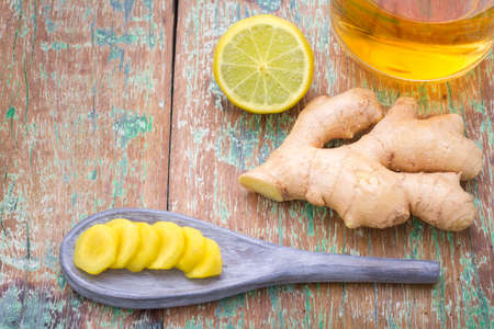 ginger and lemon on the table seen from aboveの写真素材
