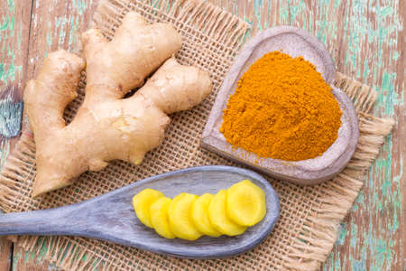 ginger roots and turmeric on the table, top viewの写真素材