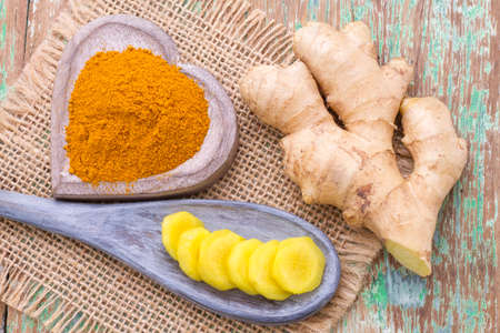 ginger roots and turmeric on the table, top viewの写真素材