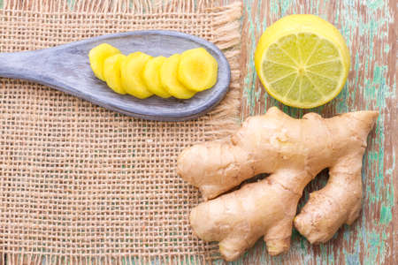 ginger and lemon on the table seen from aboveの写真素材