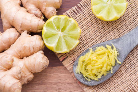 ginger and lemon on the table seen from aboveの写真素材