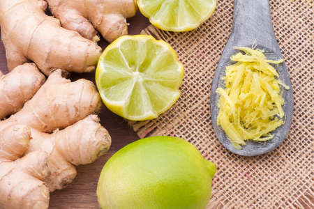 ginger and lemon on the table seen from aboveの写真素材