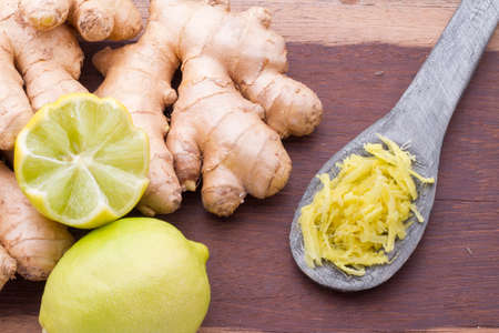 ginger and lemon on the table seen from aboveの写真素材