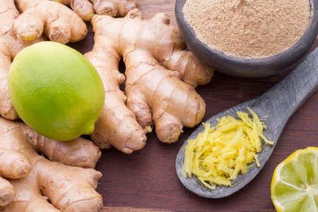 Roots and ginger powder on the table, top viewの写真素材