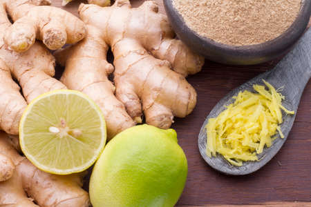 ginger and lemon on the table seen from aboveの写真素材