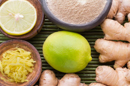 ginger and lemon on the table seen from aboveの写真素材
