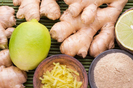 ginger and lemon on the table seen from aboveの写真素材