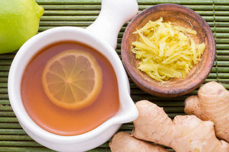 ginger and lemon on the table seen from aboveの写真素材