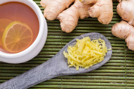 ginger and lemon on the table seen from aboveの写真素材