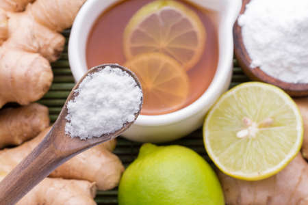 ginger, lemon and baking on the tableの写真素材