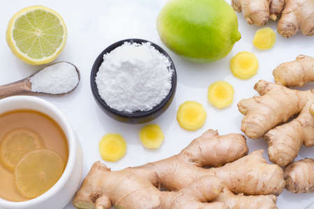 ginger and lemon on the table seen from aboveの写真素材
