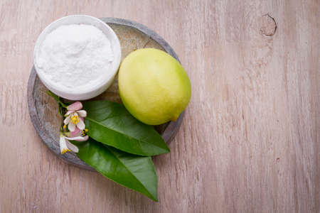 lemon and baking soda on the tableの写真素材