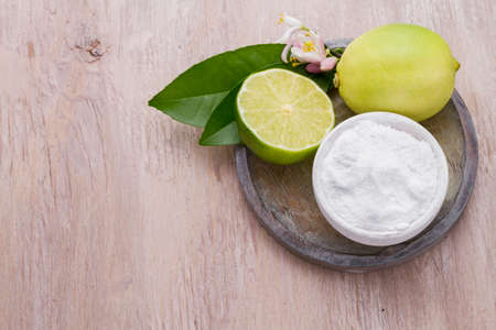lemon and baking soda on the tableの写真素材