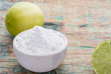 lemon and baking soda on the tableの写真素材