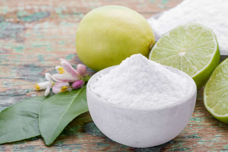 lemon and baking soda on the tableの写真素材