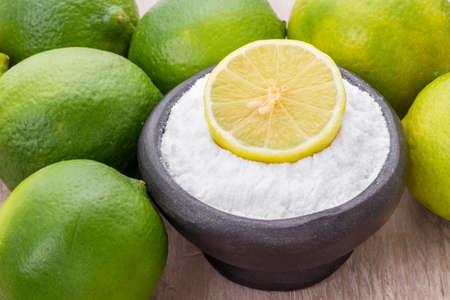 lemon and baking soda on the tableの写真素材