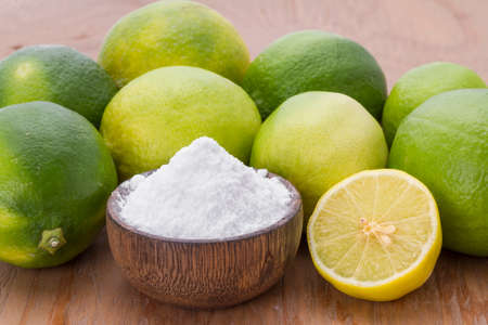 lemon and baking soda on the tableの写真素材