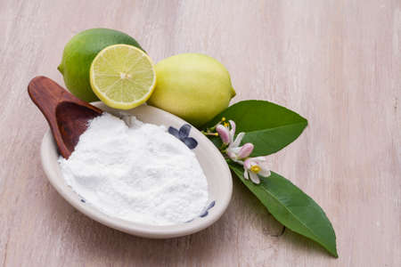 lemon and baking soda on the tableの写真素材