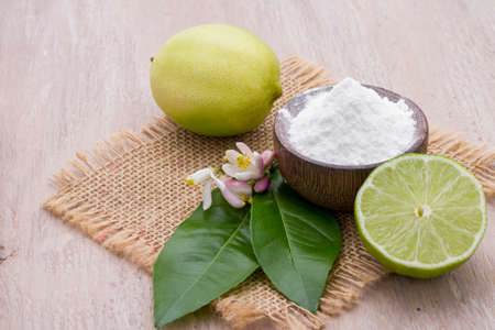 lemon and baking soda on the tableの写真素材