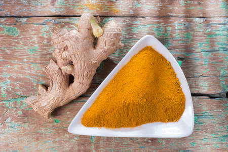 ginger root and turmeric on the tableの写真素材