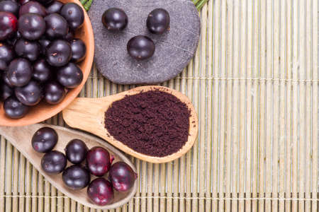 berries and acai powder, fruit of Amazonian originの写真素材