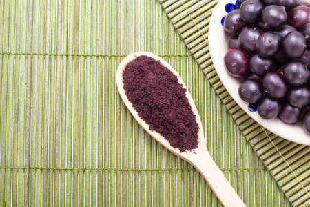 berries and acai powder, fruit of Amazonian originの写真素材
