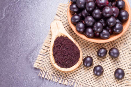 berries and acai powder, fruit of Amazonian originの写真素材