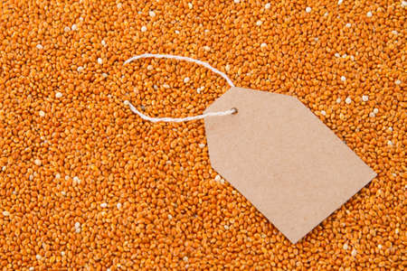 paper tag on red millet.の写真素材