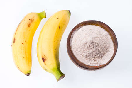 Banana fruit and flour isolated on white background (Musa Ã paradisiaca).の写真素材