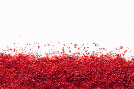 achiote seeds isolated on white backgroundの写真素材