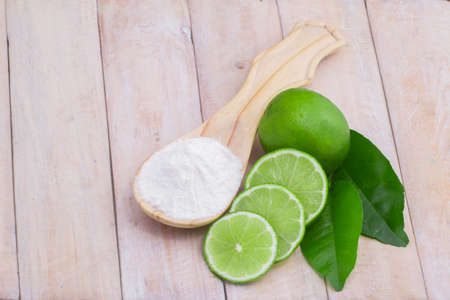 baking soda and lemon on the wooden table.の写真素材