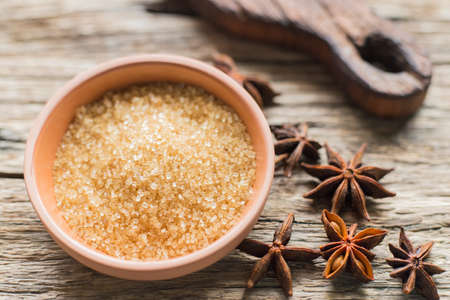 brown sugar and anise on the table.の写真素材