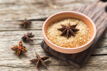 brown sugar and anise on the table.の写真素材