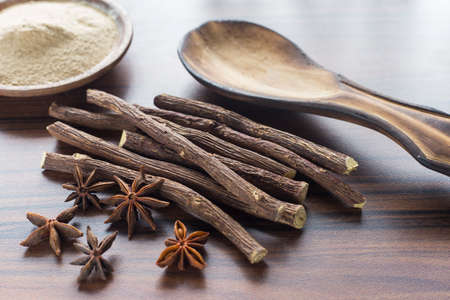 licorice root and anise on the table - Glycyrrhiza glabra.の写真素材