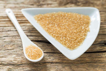 brown sugar in spoon on the table.の写真素材