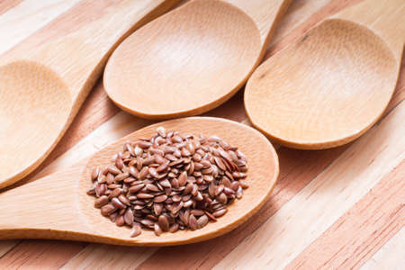 flax seed grains on the table, Linum usitatissimumの写真素材