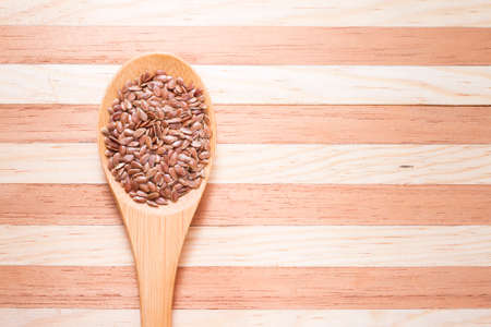 flax seed grains on the table, Linum usitatissimumの写真素材