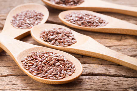 flax seed grains on the table, Linum usitatissimumの写真素材