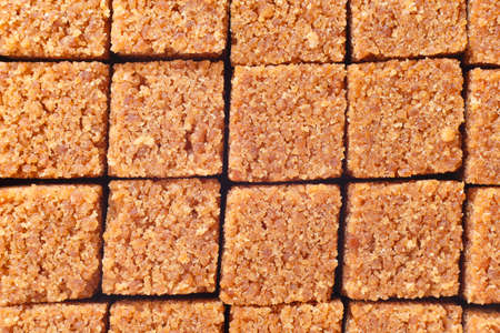background of cubes of instant panela, product derived from sugarcaneの写真素材