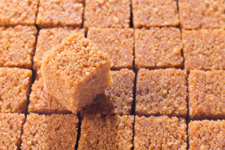 background of cubes of instant panela, product derived from sugarcaneの写真素材