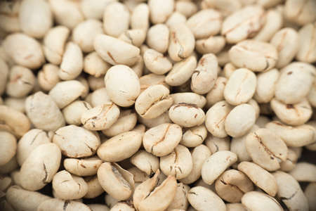unroasted coffee beans, top view - coffee tree,.