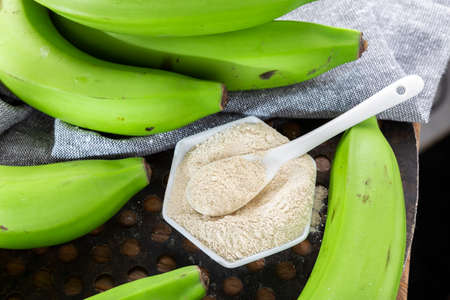 green banana flour on the table.の写真素材