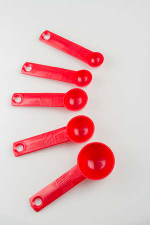 set of measuring spoons on white backgroundの写真素材