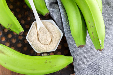 green banana flour on the table.の写真素材