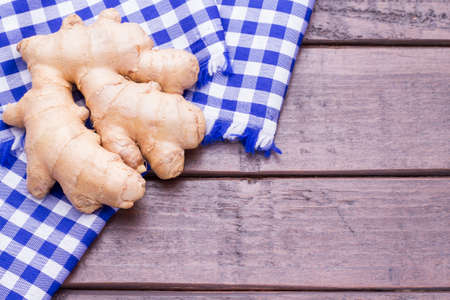 ginger root on kitchen cloth.の写真素材