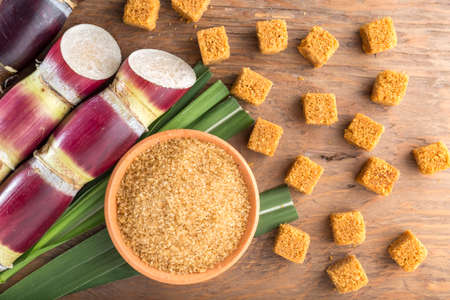 Brown sugar and cane on the table top view, imageの写真素材
