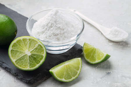 Baking soda and lemon on white backgroundの写真素材