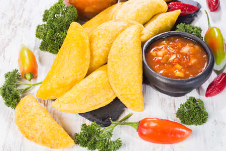 Empanadas with hot sauce, traditional Colombian foodの写真素材