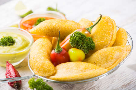Empanadas with hot sauce, traditional Colombian food
