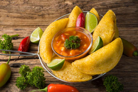 Empanadas with hot sauce, traditional Colombian foodの写真素材